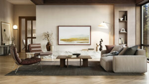 A stylish modern living room with neutral tones, featuring a wall-mounted frame TV, contemporary furniture, and natural light from large windows.