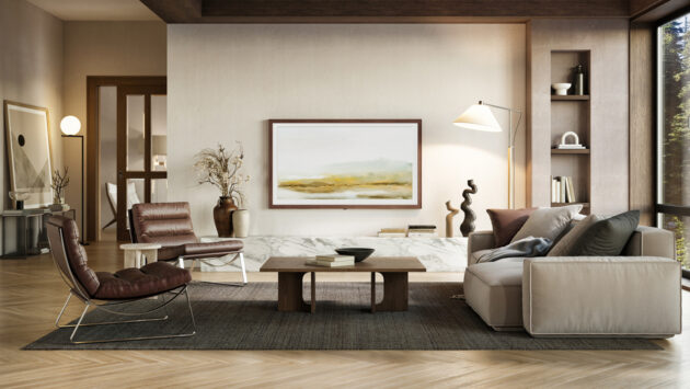 A stylish modern living room with neutral tones, featuring a wall-mounted frame TV, contemporary furniture, and natural light from large windows.